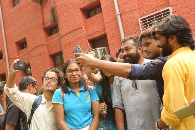Students on a selfie spree with Anurag Kashyap. (Manoj Verma/HT Photo)