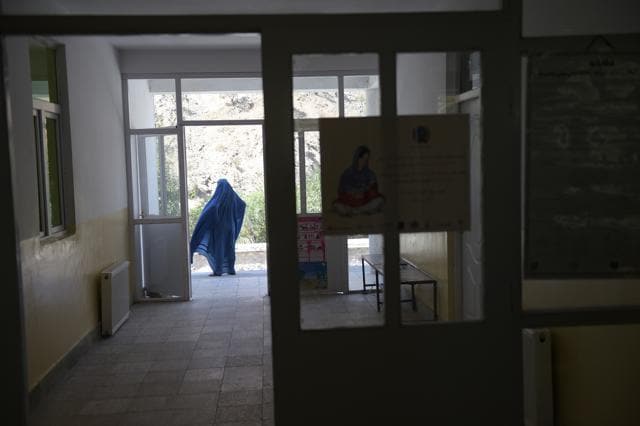 An Afghan woman walks from the entrance to Salang hospital. (AFP Photo) An Afghan woman walks from the entrance to Salang hospital. (AFP Photo)