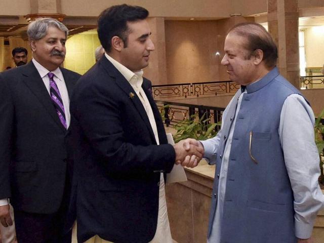 In this photo released by the Pakistan Press Information Department on Monday, Pakistani PM Nawaz Sharif (right) meets Bilawal Bhutto Zardari, chairman of the Pakistan People's party for a meeting in Islamabad. Leaders of all Pakistani political parties have been meeting to discuss the border situation with India. (AP) In this photo released by the Pakistan Press Information Department on Monday, Pakistani PM Nawaz Sharif (right) meets Bilawal Bhutto Zardari, chairman of the Pakistan People's party for a meeting in Islamabad. Leaders of all Pakistani political parties have been meeting to discuss the border situation with India. (AP)