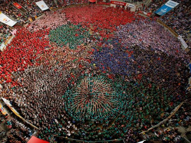 How many different teams can you spot? Does this not remind you of the dahi-handi contest that we have in almost every mohollah a day after Janmashtami? Only that this is much, much bigger. (Reuters)