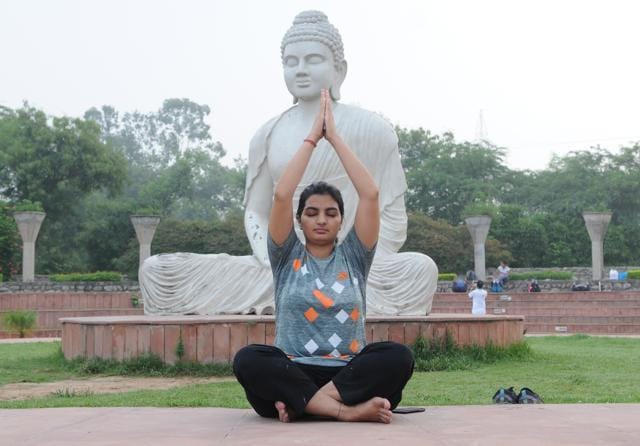 Finding peace in yoga at the Sukhna lake in Chandigarh on Friday. (Anil Dayal/HT Photo) Finding peace in yoga at the Sukhna lake in Chandigarh on Friday. (Anil Dayal/HT Photo)
