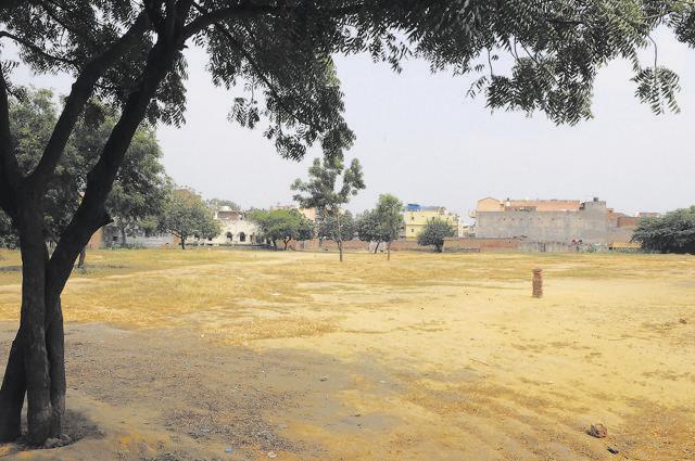 The Muslim burial ground at Patuadi Chowk was refilled recently because of the lack of space but it caught the attention of local children who started using it as a cricket ground. (Parveen Kumar/HT Photo) The Muslim burial ground at Patuadi Chowk was refilled recently because of the lack of space but it caught the attention of local children who started using it as a cricket ground. (Parveen Kumar/HT Photo)