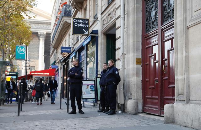 Police officers stand guard at the entrance to a hotel residence at the Rue Tronchet, near Madeleine, central Paris, on October 3, 2016, where US reality television star Kim Kardashian was robbed at gunpoint by assailants disguised as police who made off with millions, mainly in jewellery. (AFP) Police officers stand guard at the entrance to a hotel residence at the Rue Tronchet, near Madeleine, central Paris, on October 3, 2016, where US reality television star Kim Kardashian was robbed at gunpoint by assailants disguised as police who made off with millions, mainly in jewellery. (AFP)