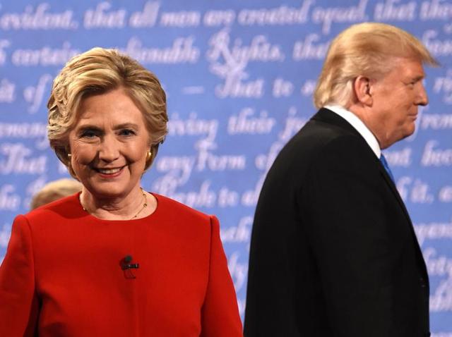 Republican US presidential nominee Donald Trump and Democratic nominee Hillary Clinton shake hands at the end of their first presidential debate at Hofstra University in Hempstead, New York, on September 26, 2016.(Reuters)