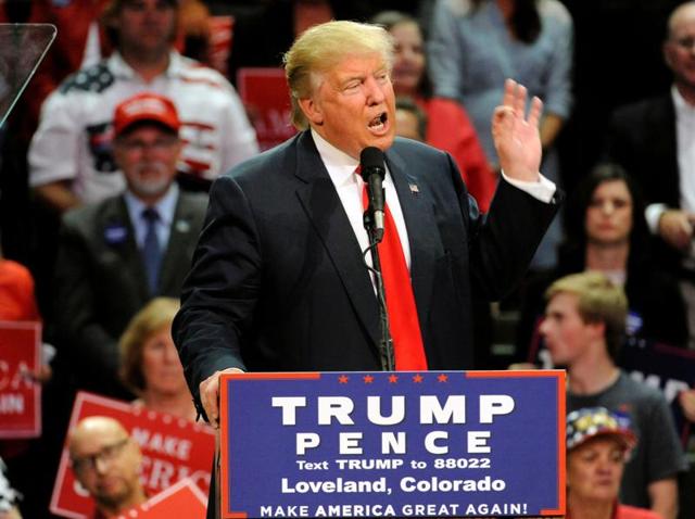 Republican presidential nominee Donald Trump applauds supporters after his speech at the Budweiser Events Center in Colorado on Monday. Trump was making his second of two campaign stops in Colorado, considered one of several swing states that could be a deciding factor in the November election. (AFP) Republican presidential nominee Donald Trump applauds supporters after his speech at the Budweiser Events Center in Colorado on Monday. Trump was making his second of two campaign stops in Colorado, considered one of several swing states that could be a deciding factor in the November election. (AFP)