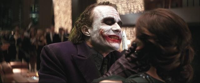 Heath Ledger and Maggie Gyllenhaal in a scene from The Dark Knight. Heath Ledger and Maggie Gyllenhaal in a scene from The Dark Knight.