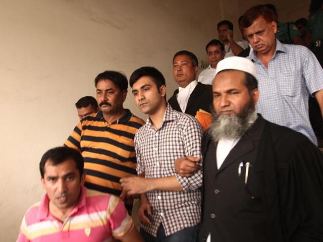 Bangladeshi policemen escort University of Toronto student Tahmid Hasib Khan (third left) and British national Hasnat Karim (second right) outside a court in Dhaka, Bangladesh on August 13. (AP File) Bangladeshi policemen escort University of Toronto student Tahmid Hasib Khan (third left) and British national Hasnat Karim (second right) outside a court in Dhaka, Bangladesh on August 13. (AP File)