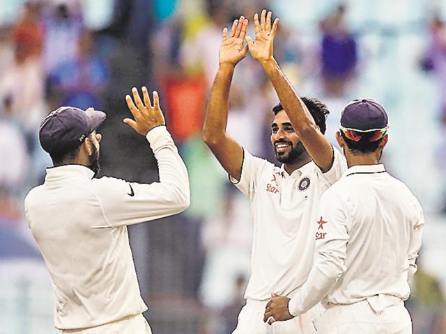 Bhuvneshwar Kumar claimed five for 48 in the first innings of the Kolkata Test.(HT Photo)