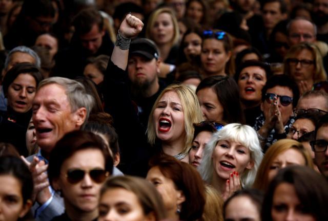 A woman shouts slogans as she takes part in an abortion rights campaigners' demonstration ‘Black Protest’ in front of the Parliament in Warsaw, Poland. (Reuters) A woman shouts slogans as she takes part in an abortion rights campaigners' demonstration ‘Black Protest’ in front of the Parliament in Warsaw, Poland. (Reuters)