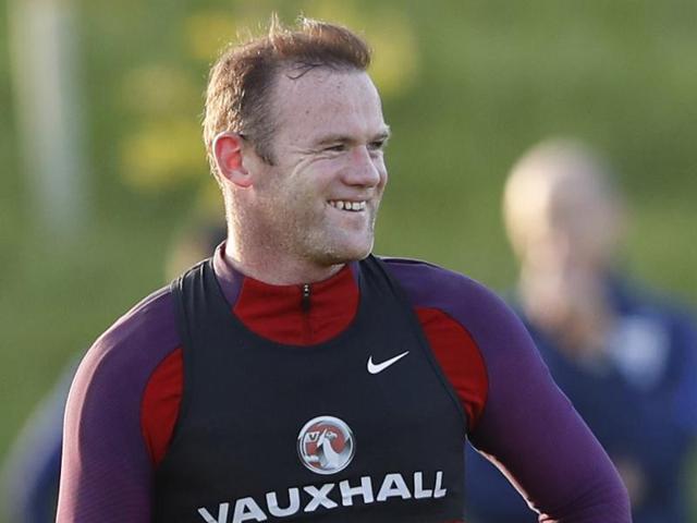 England's striker Wayne Rooney gives a press conference at England's training facility at St George's Park. (AFP Photo) England's striker Wayne Rooney gives a press conference at England's training facility at St George's Park. (AFP Photo)