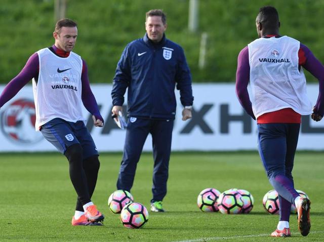 England's goalkeeper Joe Hart (L) takes part in a training session at England's training facility at St George's Park. (AFP Photo) England's goalkeeper Joe Hart (L) takes part in a training session at England's training facility at St George's Park. (AFP Photo)