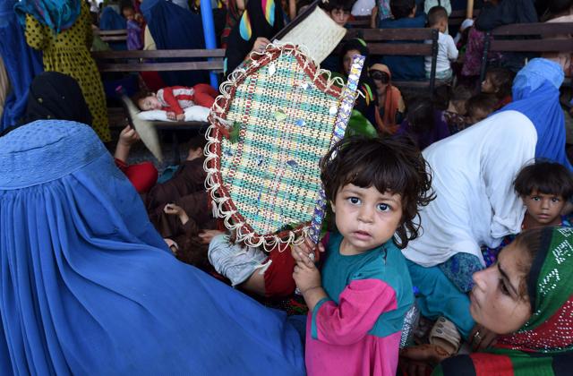 Afghan refugees wait to register at the United Nations High Commissioner for Refugees (UNHCR) repatriation centre on the outskirts of Peshawar, Pakistan. (AFP Photo) Afghan refugees wait to register at the United Nations High Commissioner for Refugees (UNHCR) repatriation centre on the outskirts of Peshawar, Pakistan. (AFP Photo)