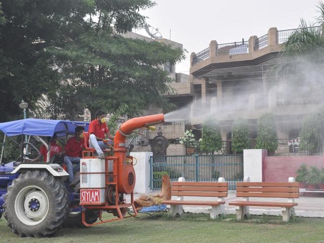 Fogging being done at a park in Panchkula’s Sector 12 on Tuesday evening. (Sant Arora/HT Photo) Fogging being done at a park in Panchkula’s Sector 12 on Tuesday evening. (Sant Arora/HT Photo)