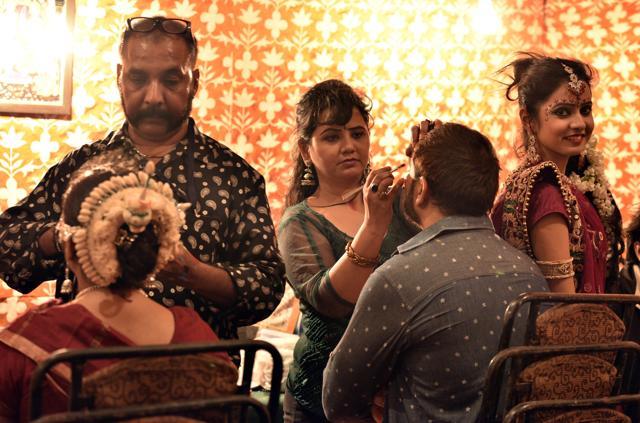 Three members of a family (L to R) father, Shalendar Kumar mother Shapna, Dother Chadni getting ready for the show at Nav Shri Dharmik Ramlila at Red Fort in New Delhi. (Arun Sharma/HT Photo) Three members of a family (L to R) father, Shalendar Kumar mother Shapna, Dother Chadni getting ready for the show at Nav Shri Dharmik Ramlila at Red Fort in New Delhi. (Arun Sharma/HT Photo)