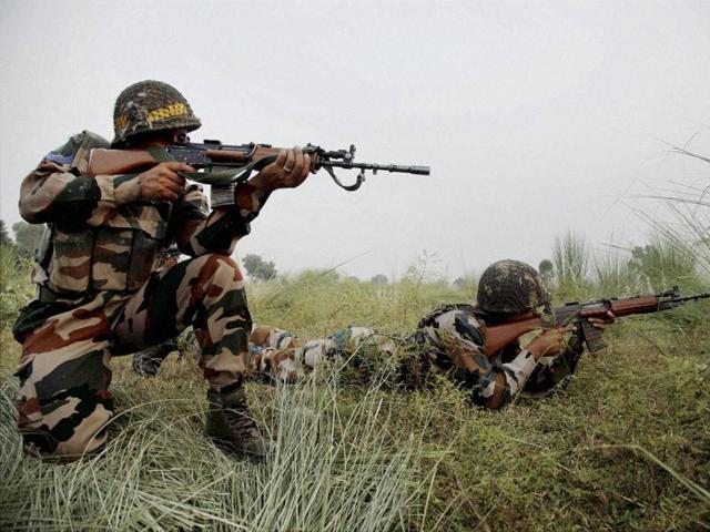 Indian army soldiers patrol near the Line of Control in Pallanwal sector, about 70 km from Jammu on Tuesday, October 4, 2016.(PTI)