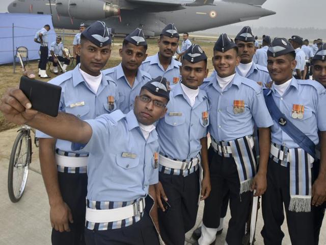 Indian Air Force soldiers take a selfie before the rehearsals. (Raj K Raj/HT PHOTO) 