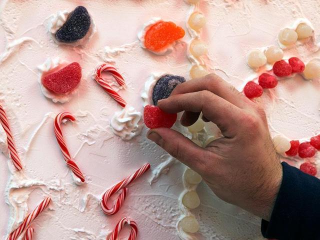 Chef Jon Lovitch affixes a piece of candy to the border of his GingerBread Lane display, at the New York Hall of Science.(Representational Image: Shutterstock) Chef Jon Lovitch affixes a piece of candy to the border of his GingerBread Lane display, at the New York Hall of Science.(Representational Image: Shutterstock)