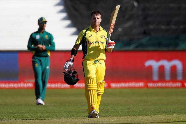 Warner celebrates his century. (AFP) Warner celebrates his century. (AFP)