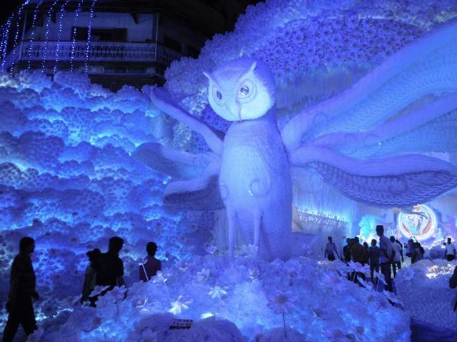 A giant owl structure is placed the Abasar club pandal for Durga Puja celebration in Kolkata. (Samir Jana/HT Photo) 