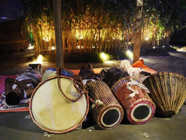 Musicians rest at a Durga Puja pandal in Kolkata. (Samir Jana/HT Photo) 