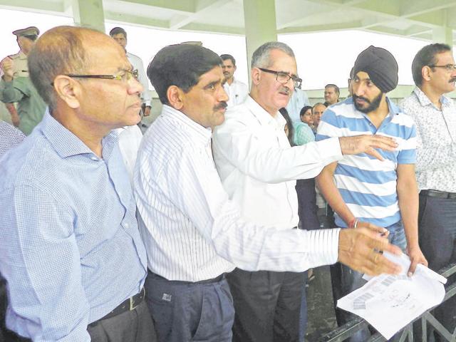 Haryana chief secretary DS Dhesi with other officials at the Tau Devi Lal stadium on Wednesday. Haryana chief secretary DS Dhesi with other officials at the Tau Devi Lal stadium on Wednesday.