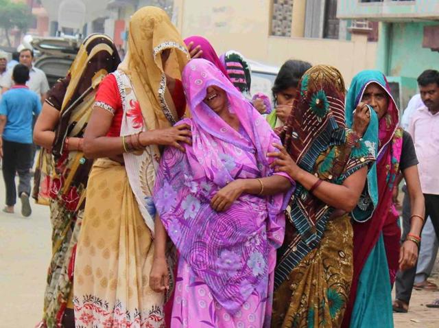 Bereaved family members of Ravin Sisodia, one of the accused in Dadri lynching case, at their house in Greater Noida.(Sunil Sharma/HT Photo)