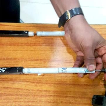 The flyer had rolled the notes into the tubes of the trolley bag (HT Photo) The flyer had rolled the notes into the tubes of the trolley bag (HT Photo)