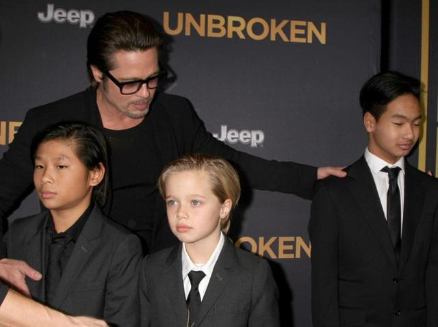 Brad Pitt, Pax, Shiloh and Maddox at the Unbroken Premiere at the Dolby Theater on December 15, 2014. (Shutterstock) Brad Pitt, Pax, Shiloh and Maddox at the Unbroken Premiere at the Dolby Theater on December 15, 2014. (Shutterstock)