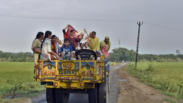 Women and children on their way home at Muhawa village near Attari in Amritsar district on Thursday. (Gurpreet Singh/HT Photo)