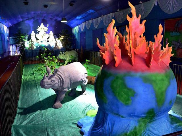Guwahati’s Chatribari Durga Puja pandal gets readied for the festive season on Friday. The theme this year is on global warming, deforestation, rhino killing and other nature-related issues. (PTI) Guwahati’s Chatribari Durga Puja pandal gets readied for the festive season on Friday. The theme this year is on global warming, deforestation, rhino killing and other nature-related issues. (PTI)