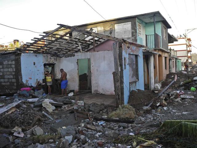 Inhabitants of Baracoa, Guantanamo province, east of Cuba clean up after hurricane Matthew passed through Haiti. (AFP Photo) Inhabitants of Baracoa, Guantanamo province, east of Cuba clean up after hurricane Matthew passed through Haiti. (AFP Photo)