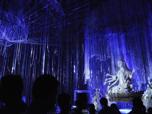 The goddess seats in the midst of blue and white lights at the Naktala Udayan Sangha Durga Puja mandap in Kolkata on Wednesday, October 5, 2016. (Samir Jana/HT PHOTO) The goddess seats in the midst of blue and white lights at the Naktala Udayan Sangha Durga Puja mandap in Kolkata on Wednesday, October 5, 2016. (Samir Jana/HT PHOTO)