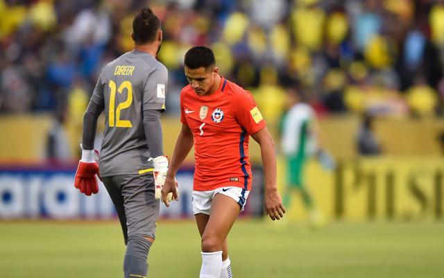 Chile's Alexis Sanchez (R) leaves the field in dejection after his team’s loss. (AFP) Chile's Alexis Sanchez (R) leaves the field in dejection after his team’s loss. (AFP)
