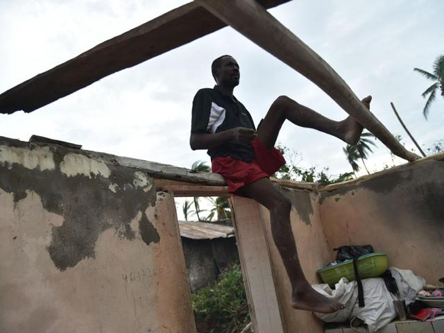Residents repair their home after the passing of Hurricane Matthew in Sous Roche in Les Cayes, Southwest Haiti on Thursday. (AFP) Residents repair their home after the passing of Hurricane Matthew in Sous Roche in Les Cayes, Southwest Haiti on Thursday. (AFP)