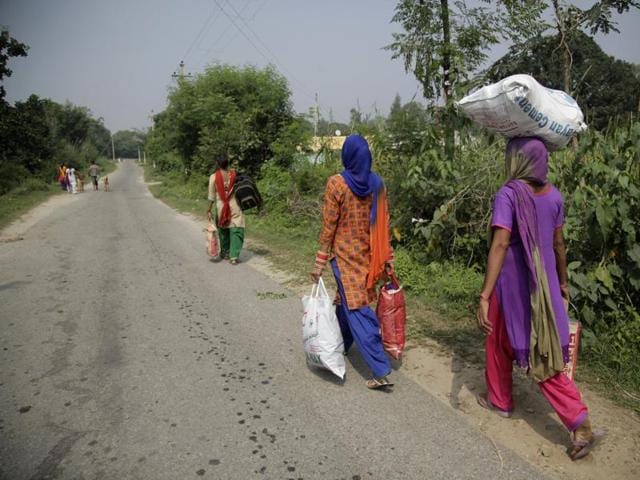Residents living close to the border with Pakistan move to safer places after authorities ordered the evacuation of villages near the LoC, at Narana village in Pallanwal in Jammu and Kashmir. (AP Photo) Residents living close to the border with Pakistan move to safer places after authorities ordered the evacuation of villages near the LoC, at Narana village in Pallanwal in Jammu and Kashmir. (AP Photo)