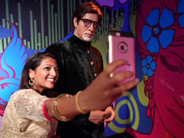 Even here, Big B is looking into the camera. (AFP Photo) Even here, Big B is looking into the camera. (AFP Photo)