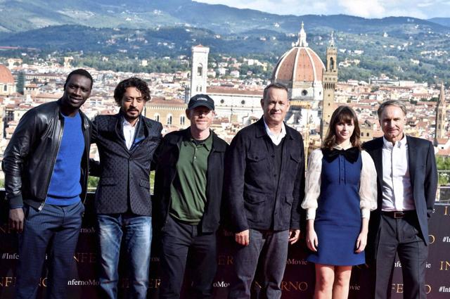 Florence : From left, Actors Omar Sy, and Irrfan Khan, Director Ron Howard, actor Tom Hanks, actress Felicity Jones and writer Dan Brown pose for photographers during a photocall to present the movie Inferno at the Belvedere fortress in Florence, Italy. (AP)