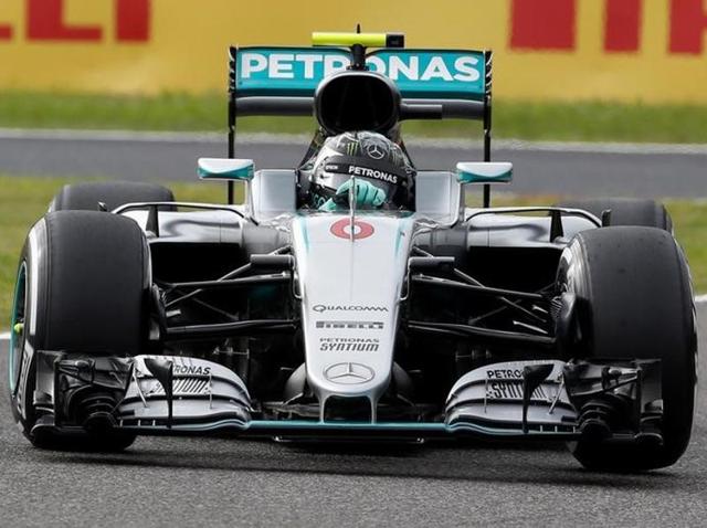 From left to right: Lewis Hamilton, Nico Rosberg and Kimi Raikkonen wave to fans after the qualifying session. (REUTERS) From left to right: Lewis Hamilton, Nico Rosberg and Kimi Raikkonen wave to fans after the qualifying session. (REUTERS)