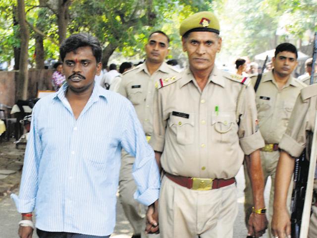 The prime accused in the Nithari case Surinder Koli (left) was awarded death penalty on Friday. (Sakib Ali/HT Photo) The prime accused in the Nithari case Surinder Koli (left) was awarded death penalty on Friday. (Sakib Ali/HT Photo)