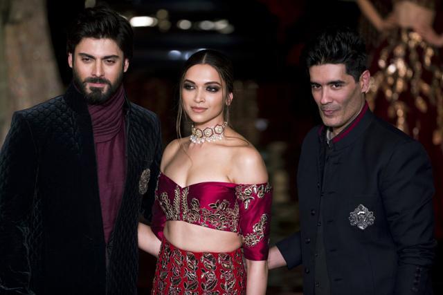 Bollywood actors Deepika Padukone, and Fawad Khan, left, with India designer Manish Malhotra, right, at the India Couture Week 2016 in New Delhi. (AP) Bollywood actors Deepika Padukone, and Fawad Khan, left, with India designer Manish Malhotra, right, at the India Couture Week 2016 in New Delhi. (AP)