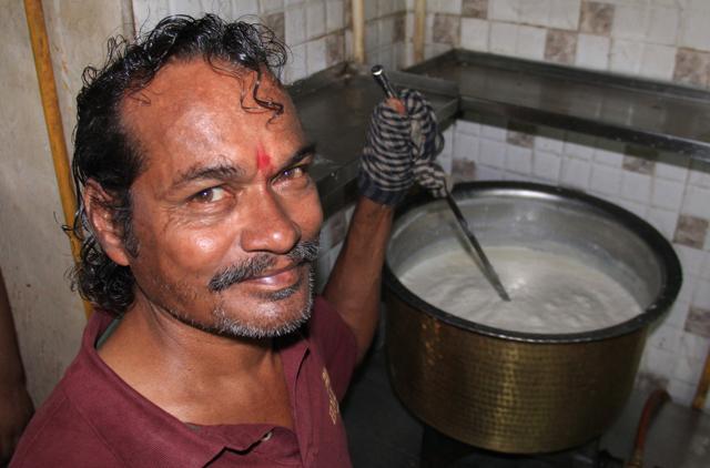 Fondly called Ram ‘Anna’ or elder brother, the Kheer chef at Crystal in Girgaum says it takes him around four hours to make 30 litres of the dessert. (Bhushan Koyande/HT)