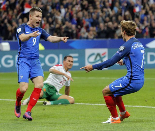 Kevin Gameiro, left, celebrates scoring France's fourth goal with teammate Antoine Griezmann. (AP) Kevin Gameiro, left, celebrates scoring France's fourth goal with teammate Antoine Griezmann. (AP)