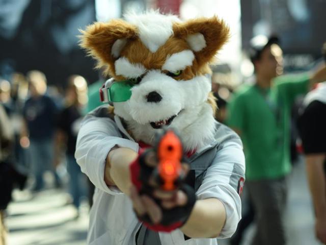 Comic Con fans in costume arrive for the 2nd day of the 2016 New York Comic Con at the Jacob Javits Center on October 7, 2016. The four-day event which runs October 6-9 is the largest pop culture event on the East Coast. / AFP PHOTO / TIMOTHY A. CLARY (AFP) Comic Con fans in costume arrive for the 2nd day of the 2016 New York Comic Con at the Jacob Javits Center on October 7, 2016. The four-day event which runs October 6-9 is the largest pop culture event on the East Coast. / AFP PHOTO / TIMOTHY A. CLARY (AFP)