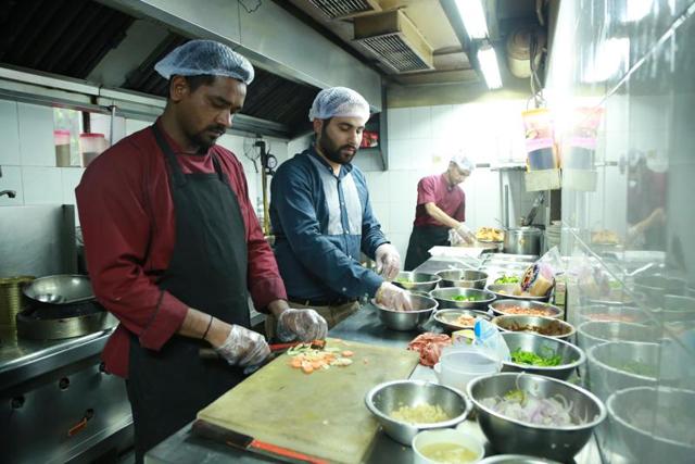 The kitchen staff at Alliance Francaise’s Cafetaria is busy cooking almost throughout the day since youngsters throng the place for Indian as well as French delights which are available at pocket-friendly prices. (Amal KS/HT Photo)