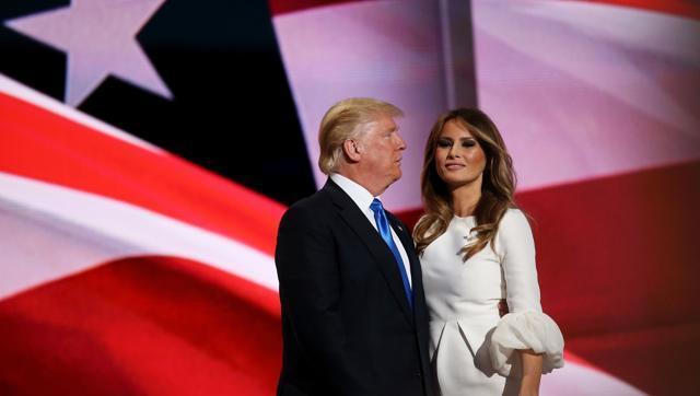 Presumptive Republican presidential nominee Donald Trump stands with his wife Melania after she delivered a speech on the first day of the Republican National Convention at the Quicken Loans Arena in Cleveland, Ohio on Monday. (AFP) Presumptive Republican presidential nominee Donald Trump stands with his wife Melania after she delivered a speech on the first day of the Republican National Convention at the Quicken Loans Arena in Cleveland, Ohio on Monday. (AFP)