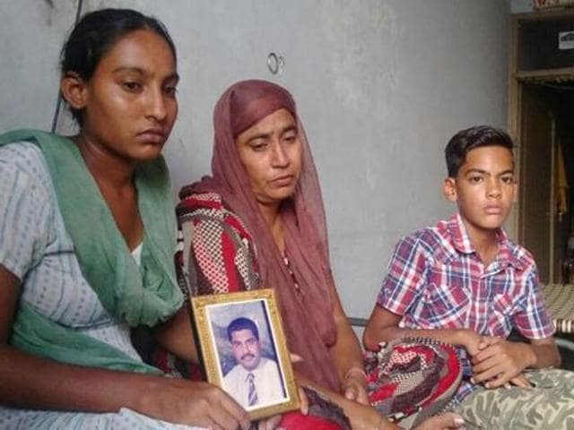 Gurdeep Singh’s daughter Manjot Kaur, wife Kulwinder Kaur and son Sukhbir Singh at their house in Khehra Mohalla of Nakodar in Jalandhar district. (Sikander Singh Chopra/HT Photo) Gurdeep Singh’s daughter Manjot Kaur, wife Kulwinder Kaur and son Sukhbir Singh at their house in Khehra Mohalla of Nakodar in Jalandhar district. (Sikander Singh Chopra/HT Photo)