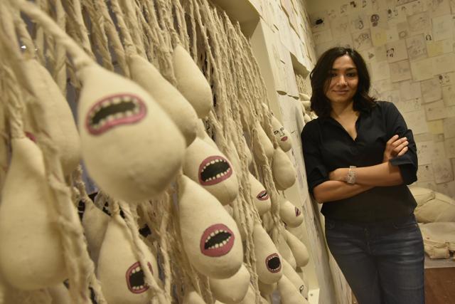 Mumbai based artist Dhruvi Acharya, poses with her creation. (Arijit Sen/HT PHOTO) Mumbai based artist Dhruvi Acharya, poses with her creation. (Arijit Sen/HT PHOTO)