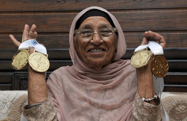 Mann Kaur, 100, showing her medals at her house in Chandigarh. (Keshav Singh/HT Photo)