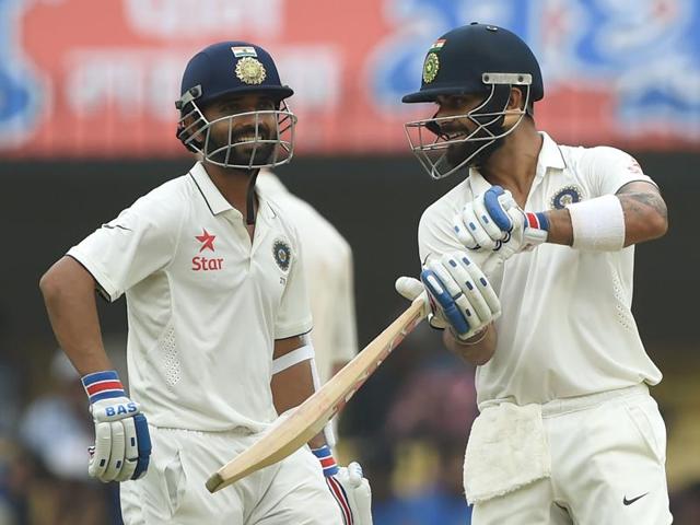 Rahane and Kohli share a lighter moment. (AFP) 