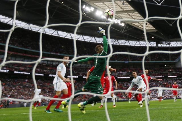 Dele Alli scores England’s second goal. (REUTERS) Dele Alli scores England’s second goal. (REUTERS)